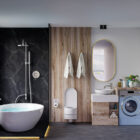 A luxurious bathroom featuring a freestanding tub and marble accents